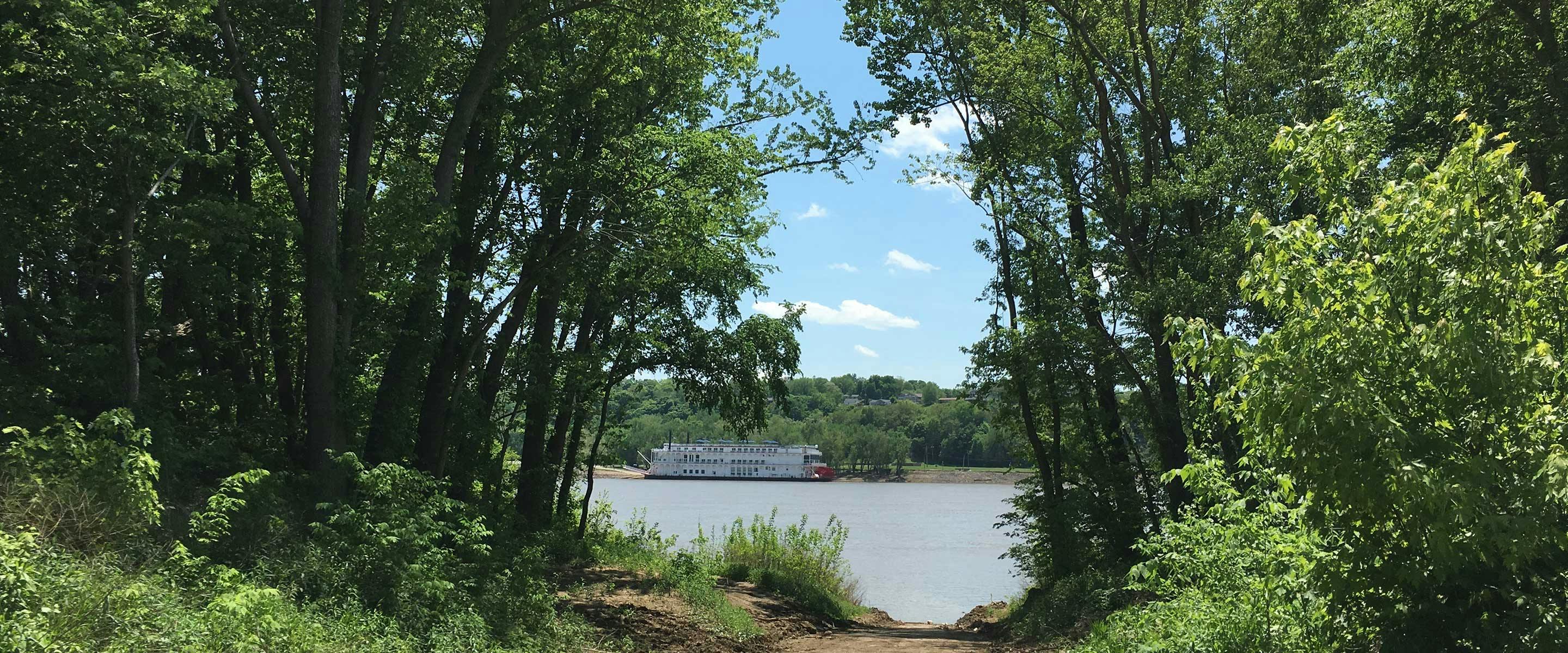 beautiful view of the rive3r between an opening in the trees at Morvin's Landing